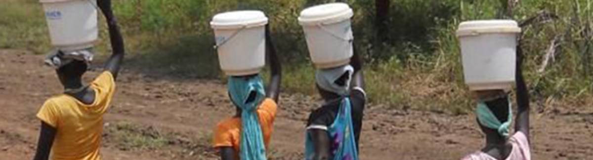 African Women Carrying Water